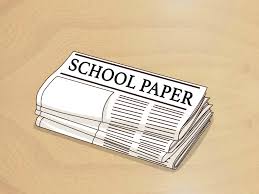 Picture of a newspaper on a beige background.